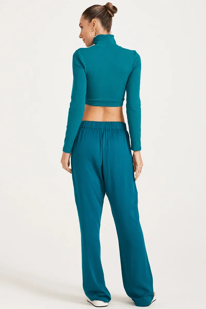 BLUSA CONVERSÃO DE MALHA COM GOLA ALTA COLEÇÃO VERÃO 24