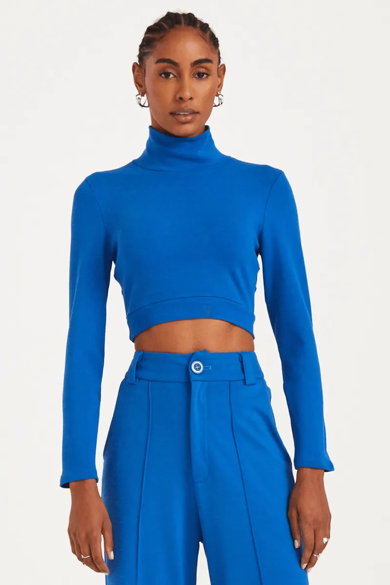 BLUSA CONVERSÃO DE MALHA COM GOLA ALTA COLEÇÃO VERÃO 24