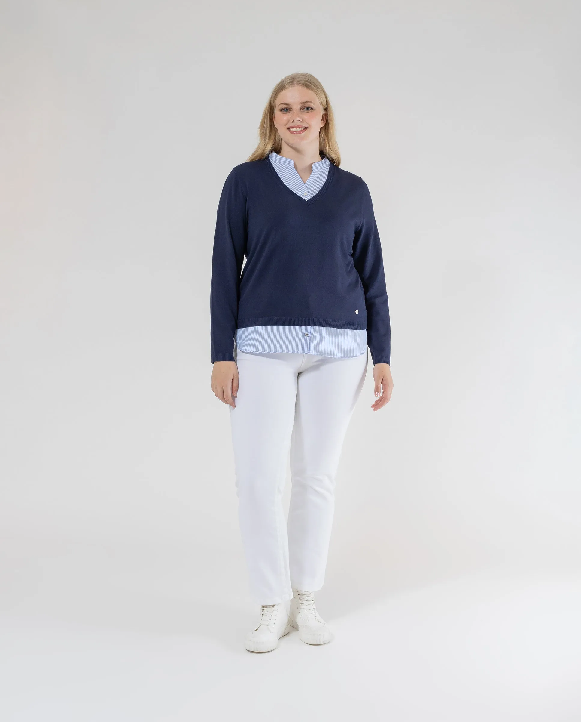 JERSEY ESCOTE PICO Y MANGA LARGA CON CUELLO Y FALDON AZUL OSCURO